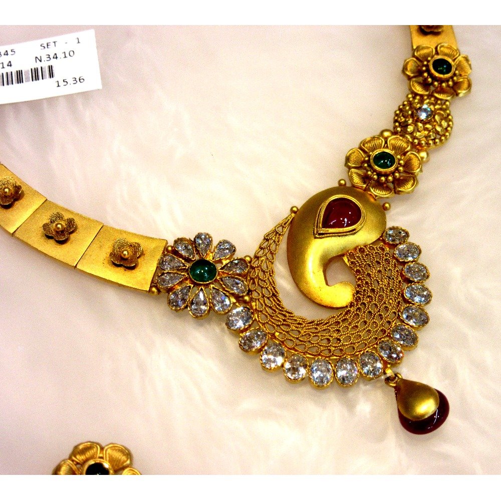 Gold hm916 asymmetrical designer jadtar necklace set