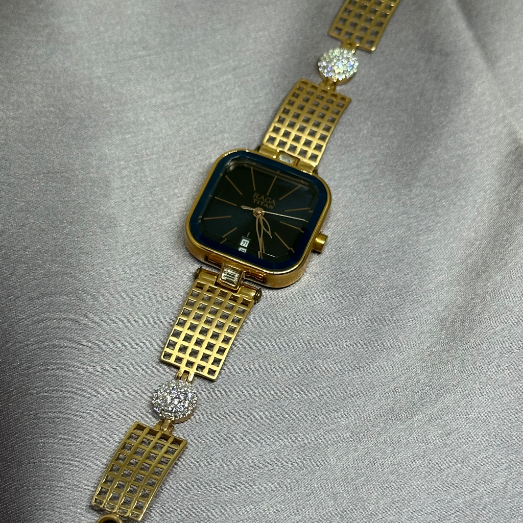 18K gold titan ladies watch