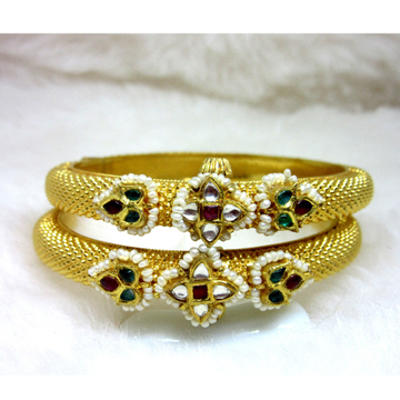 Gold jadtar bangles by 