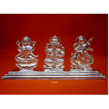 silver trimurti shree lakshmi-Ganesha-Saraswati Mu... by 