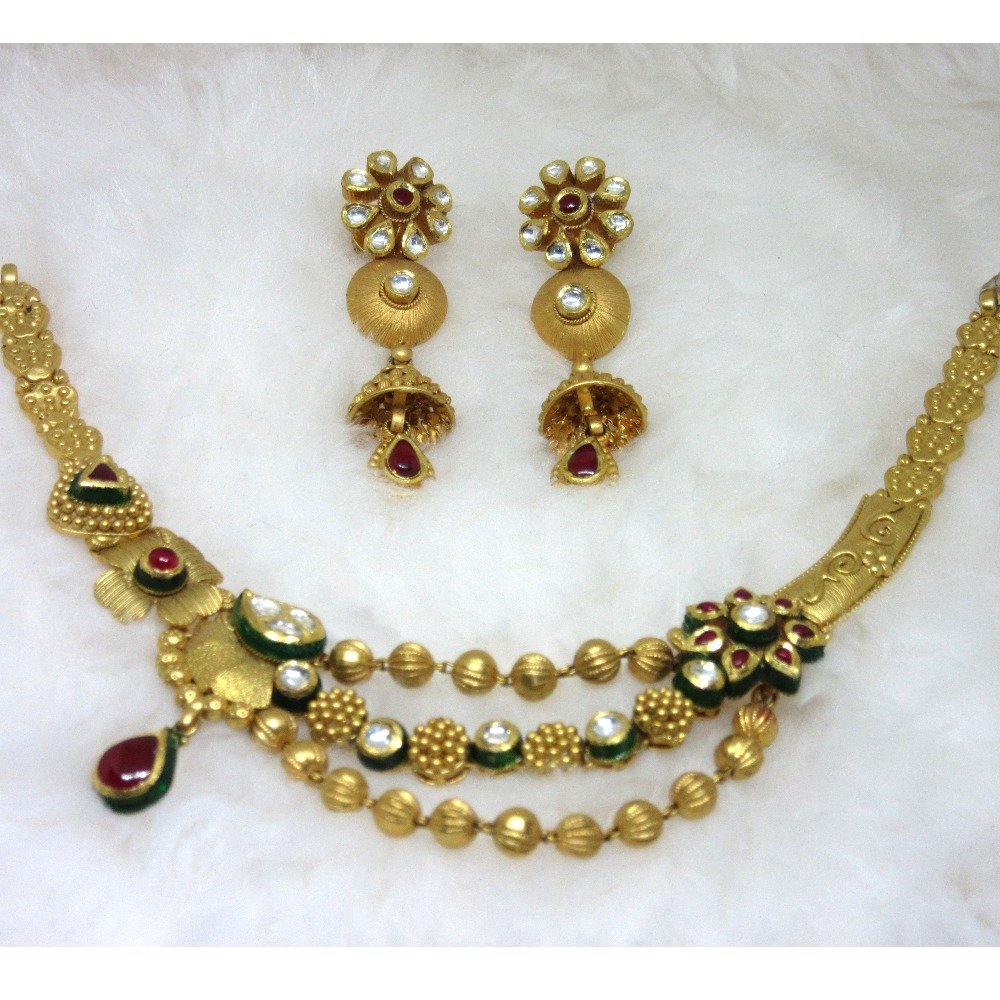 Fashionable three line designer gold jadtar set