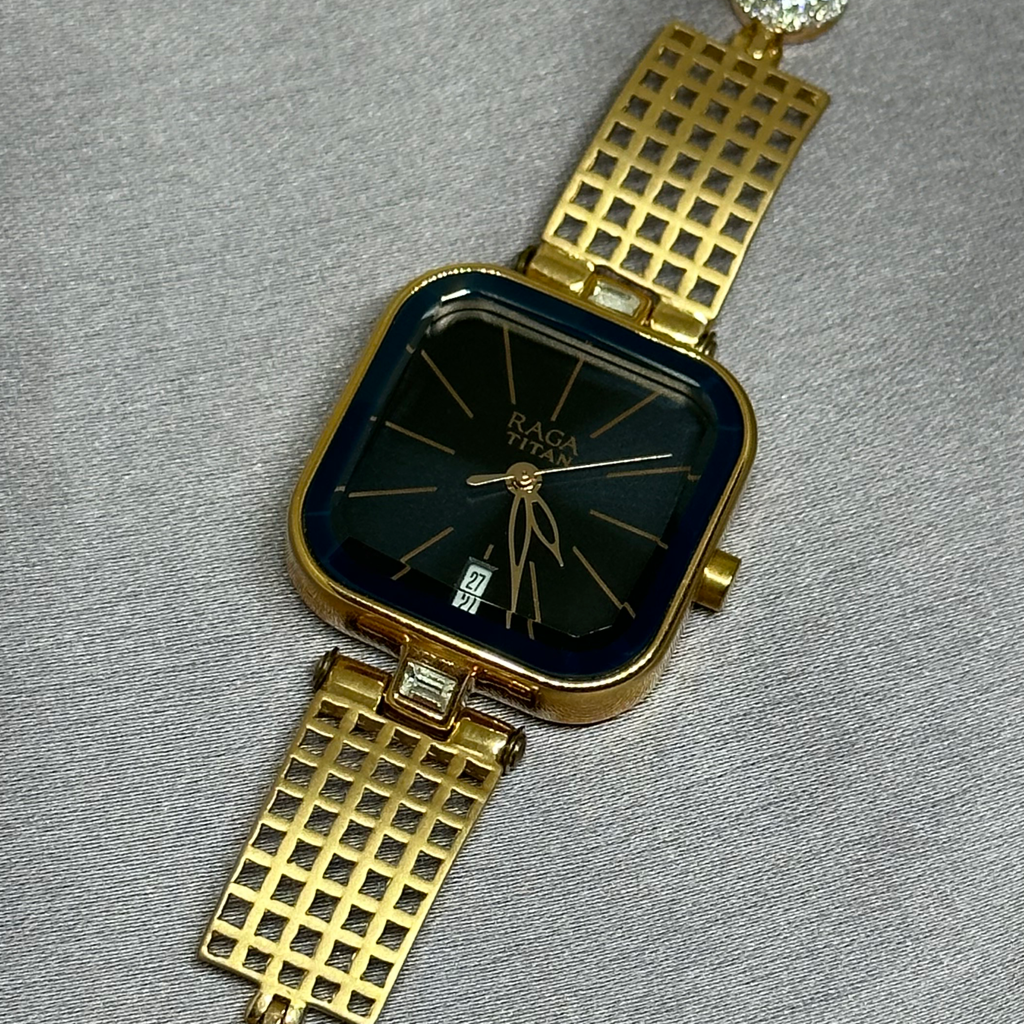 18K gold titan ladies watch